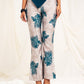 Printed high waist slim-fit trousers with slit at the hem